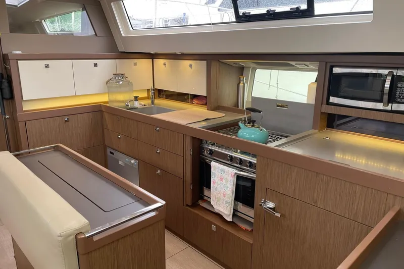 Slide: The Image of Luxurious kitchen interior of 2017 Beneteau Sense 57 yacht with modern appliances. - 116