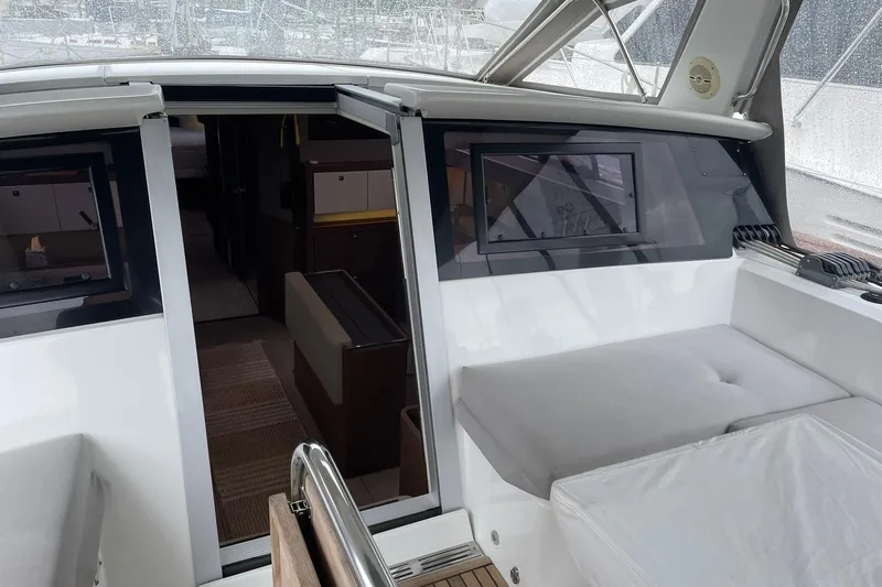 Slide: The Image of 2017 Beneteau Sense 57 yacht interior with sleek design and comfortable seating. - 120