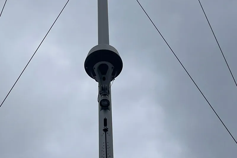 Slide: The Image of Mast of 2017 Beneteau Sense 50 sailboat against cloudy sky. - 18
