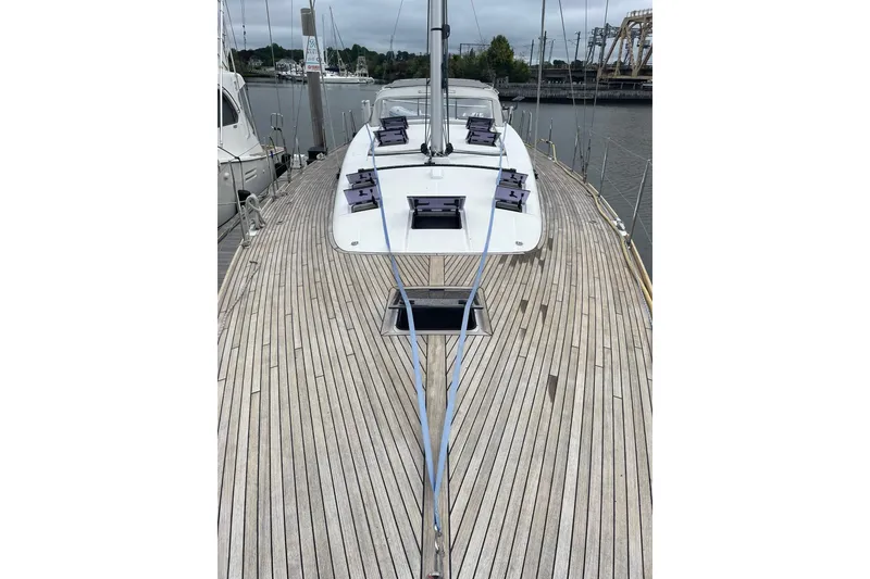 Slide: The Image of 2017 Beneteau Sense 50 yacht with sleek wooden deck and modern design. - 2