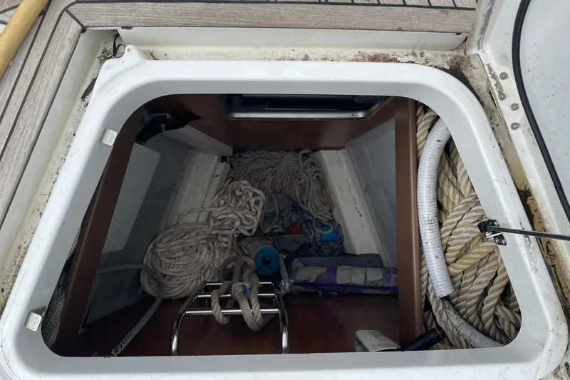 Slide: The Image of Storage compartment on a 2017 Beneteau Sense 50 yacht with ropes and equipment. - 30
