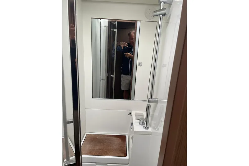 Slide: The Image of Bathroom interior of 2017 Beneteau Sense 50 yacht with shower and mirror. - 44