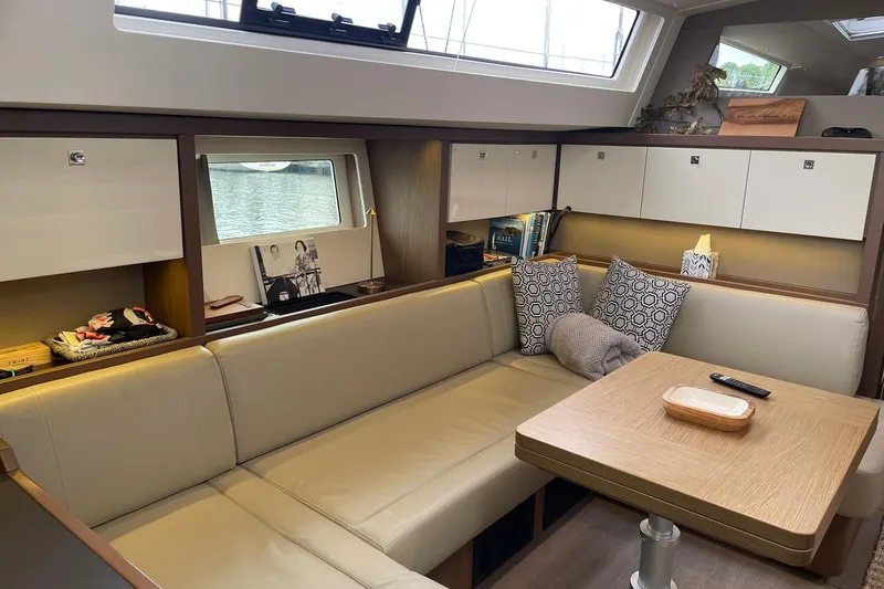 Slide: The Image of Interior of 2017 Beneteau Sense 57 yacht with elegant seating and modern decor. - 94