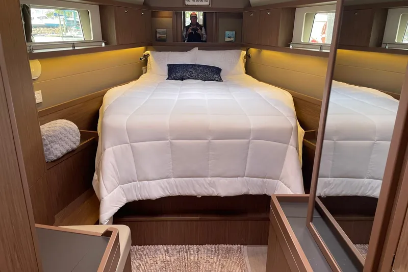 Slide: The Image of Luxurious cabin interior of 2017 Beneteau Sense 57 yacht with cozy bedding. - 96