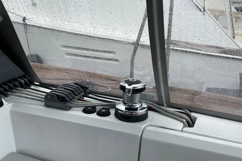 Slide: The Image of Cockpit view of 2017 Beneteau Sense 57 yacht with winch and wet window. - 99