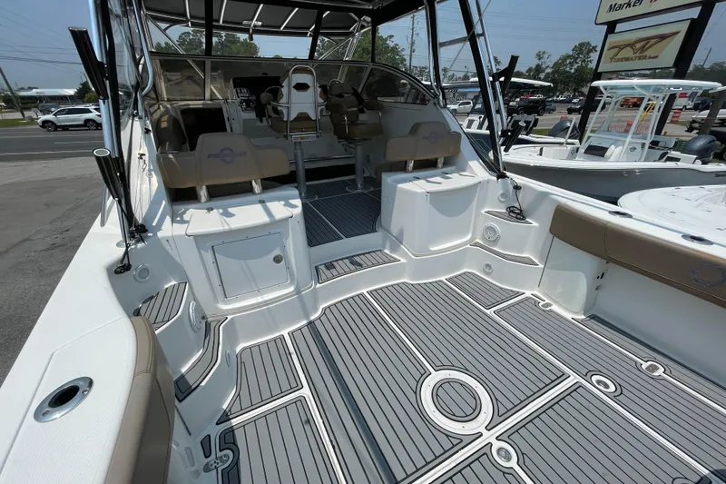 Slide: The Image of 2007 Fountain 38 Sportfish Cruiser OB with spacious deck and seating area. - 11