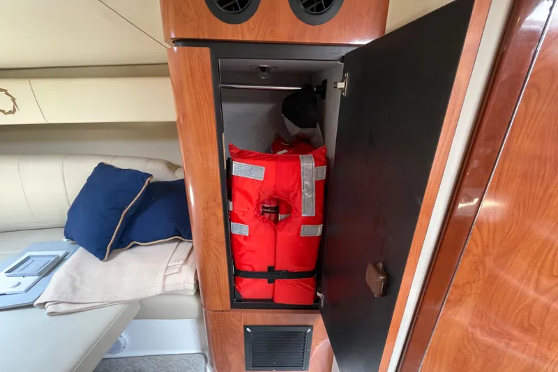 Slide: The Image of 2007 Fountain 38 Sportfish Cruiser OB interior with life jacket storage. - 33