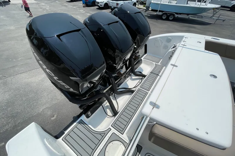 Slide: The Image of 2007 Fountain 38 Sportfish Cruiser OB with triple Mercury outboard engines. - 9