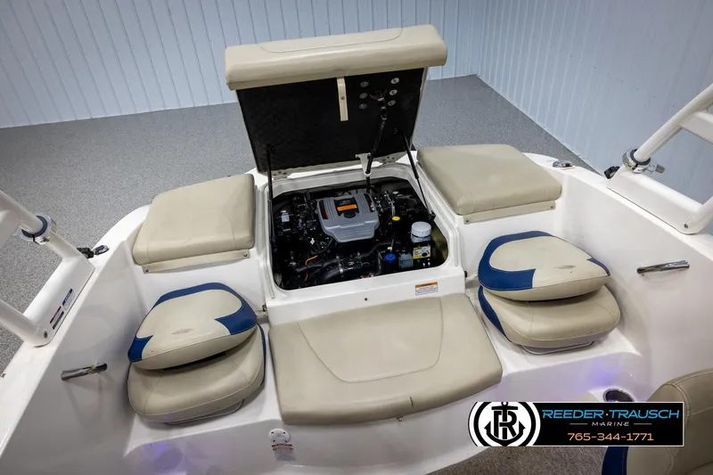 Slide: The Image of 2015 Chaparral 19 H2O Ski & Fish boat interior with open engine compartment. - 23