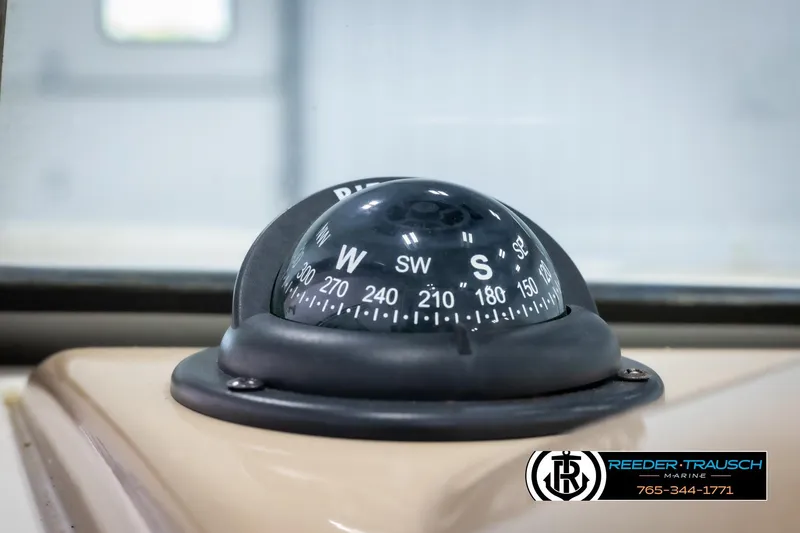 Slide: The Image of Compass on 2015 Chaparral 19 H2O Ski & Fish boat dashboard, Reeder-Trausch Marine logo visible. - 29