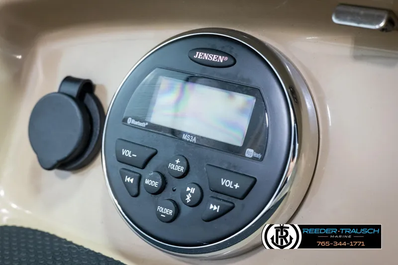 Slide: The Image of Jensen audio system in 2015 Chaparral 19 H2O Ski & Fish boat dashboard. - 38