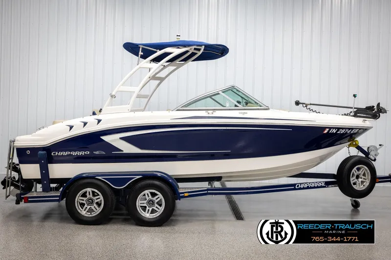 Slide: The Image of 2015 Chaparral 19 H2O Ski & Fish boat on trailer in showroom. - 5