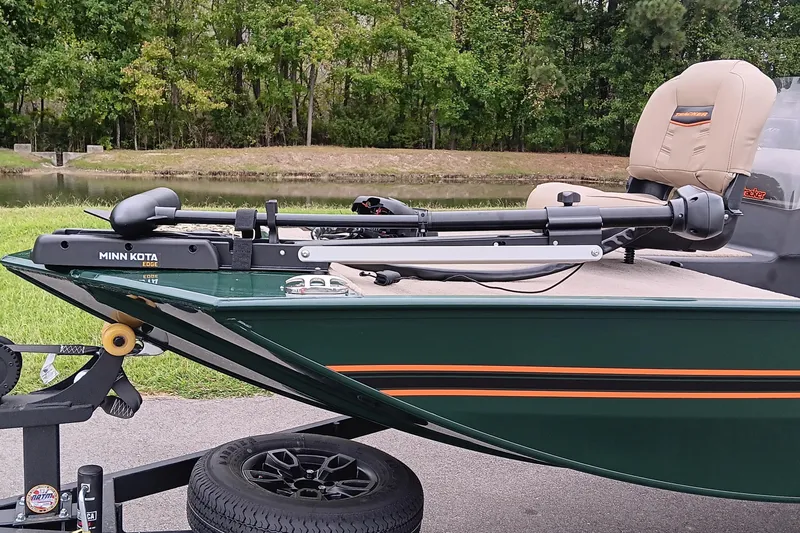 Slide: The Image of 2026 Tracker Bass Tracker Classic Limited boat with Minn Kota trolling motor. - 7