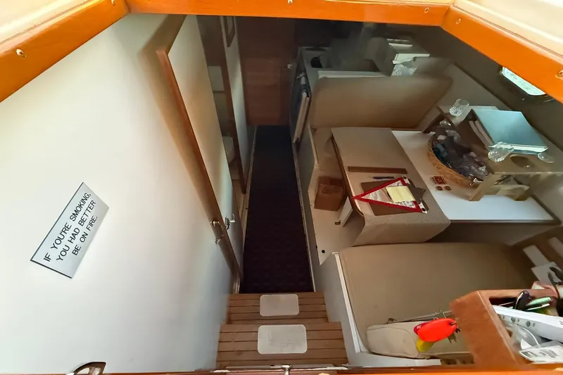 Slide: The Image of Interior view of 1979 Magnum 38 Sport boat with humorous smoking sign. - 27