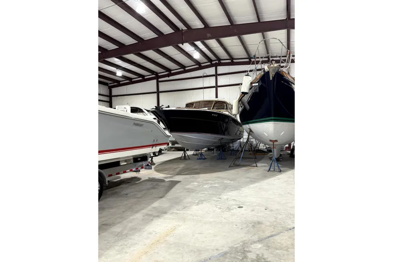 Slide: The Image of 1979 Magnum 38 Sport boat on trailer at Boyne Boat Yard, side view. - 4