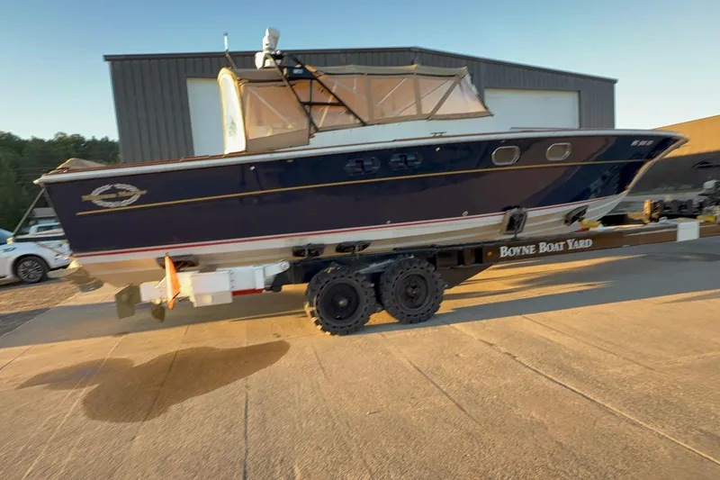 Slide: The Image of 1979 Magnum 38 Sport boat on trailer at Boyne Boat Yard. - 56