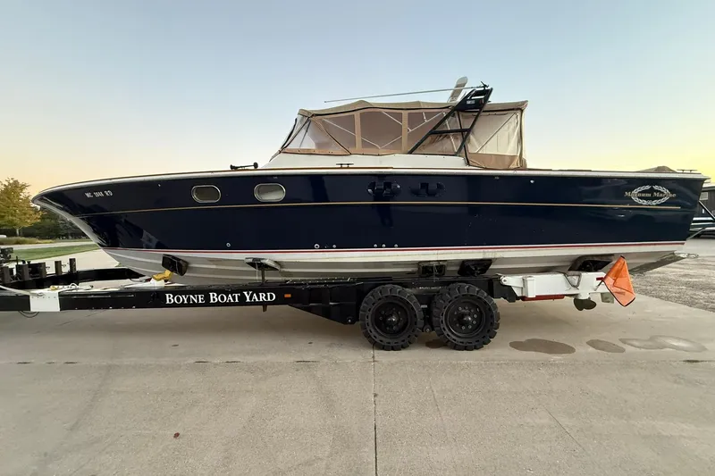 Slide: The Image of 1979 Magnum 38 Sport boat on trailer at Boyne Boat Yard. - 9