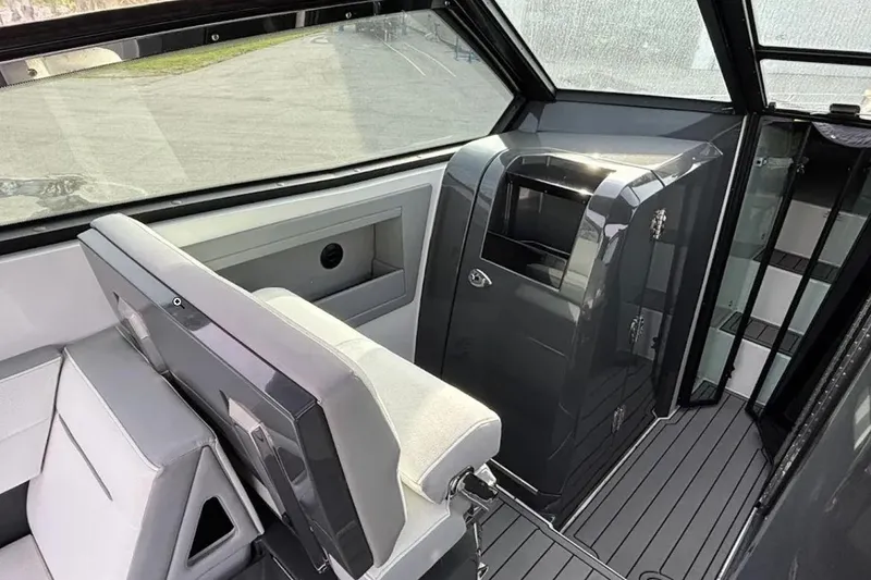 Slide: The Image of Interior of 2019 Cobalt A36 boat with sleek seating and modern design. - 12