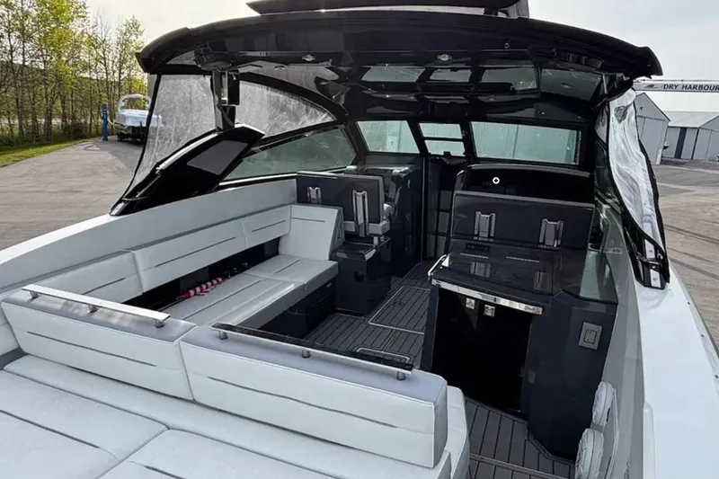 Slide: The Image of 2019 Cobalt A36 boat interior with sleek seating and modern amenities. - 16