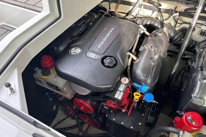 Slide: The Image of Engine compartment of a 2019 Cobalt A36 boat featuring a Volvo Penta engine. - 19