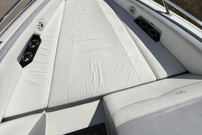 Slide: The Image of Luxurious seating area on 2019 Cobalt A36 boat with cup holders and speakers. - 20