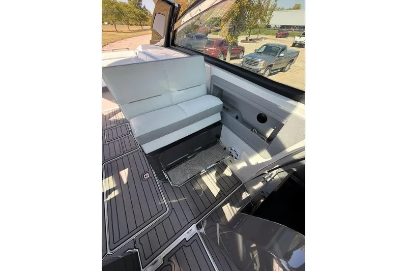 Slide: The Image of 2019 Cobalt A36 boat interior with sleek seating and modern design elements. - 37