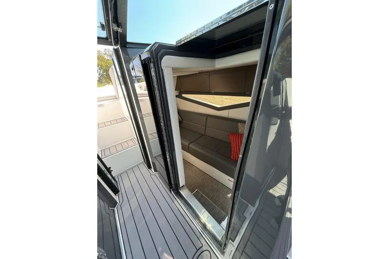 Slide: The Image of 2019 Cobalt A36 boat interior with modern seating and sleek design. - 40