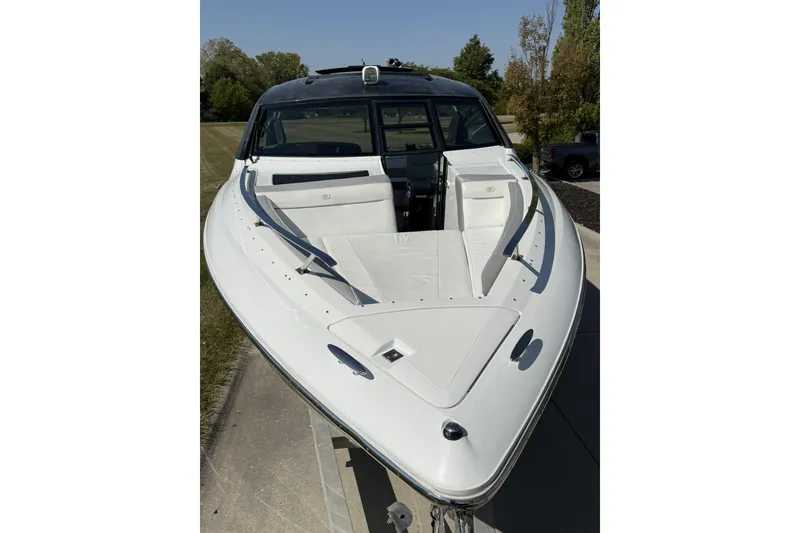 Slide: The Image of 2019 Cobalt A36 boat with sleek white design and spacious seating. - 5