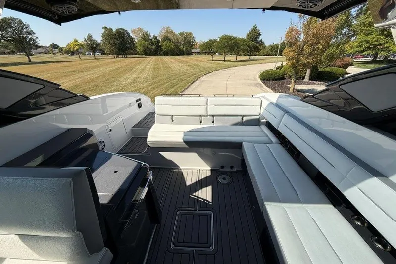 Slide: The Image of 2019 Cobalt A36 boat interior with spacious seating and sleek design. - 52