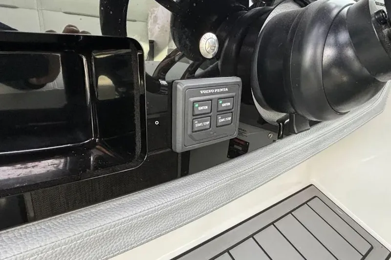 Slide: The Image of 2019 Cobalt A36 boat dashboard with Volvo Penta controls and steering wheel. - 9