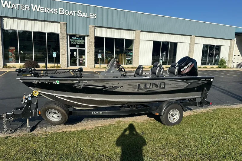 Slide: The Image of 2016 Lund 1775 Pro-V SS boat on trailer outside Water Werks Boat Sales. - 1