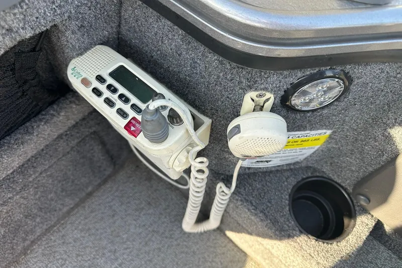 Slide: The Image of 2016 Lund 1775 Pro-V SS boat interior with radio and speaker system. - 25