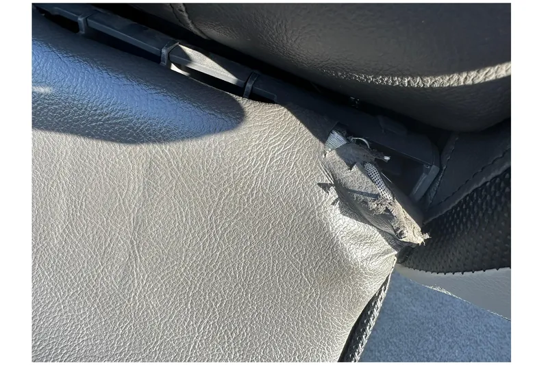 Slide: The Image of Torn seat upholstery on 2016 Lund 1775 Pro-V SS boat. - 26