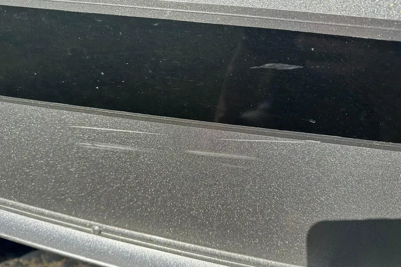 Slide: The Image of Close-up of a 2016 Lund 1775 Pro-V SS boat exterior with metallic finish. - 27