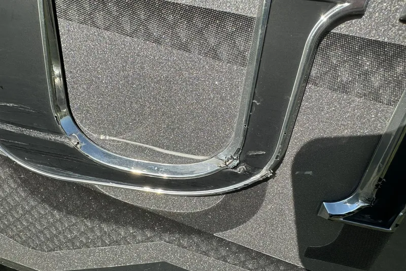 Slide: The Image of Close-up of 2016 Lund 1775 Pro-V SS boat emblem with metallic finish. - 29