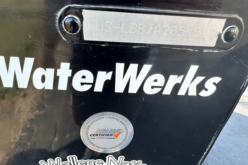 Slide: The Image of WaterWerks branding on 2016 Lund 1775 Pro-V SS boat with certification sticker. - 36