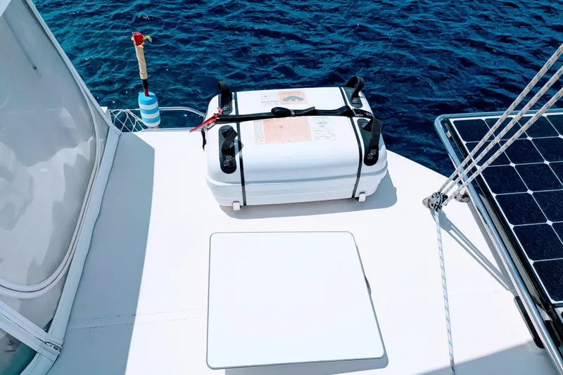 Slide: The Image of Deck of 2023 Leopard 42 catamaran with solar panel and storage box. - 23