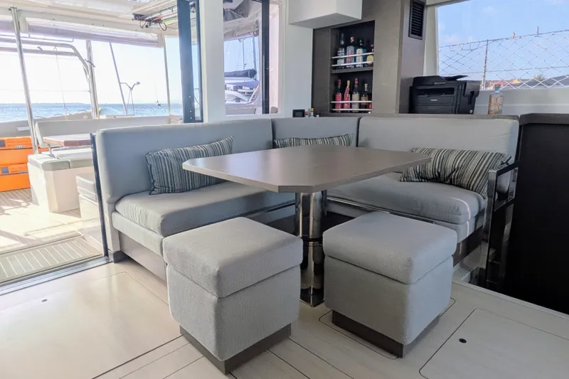 Slide: The Image of Modern interior of 2023 Leopard 42 yacht with cozy seating and ocean view. - 43