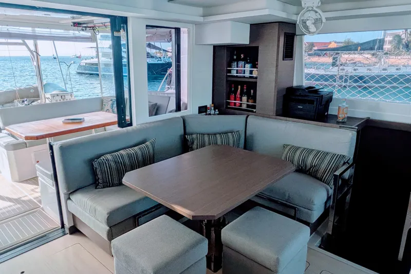 Slide: The Image of Luxurious Leopard 42 yacht interior with dining area, ocean view, and modern amenities, 2023 model. - 45