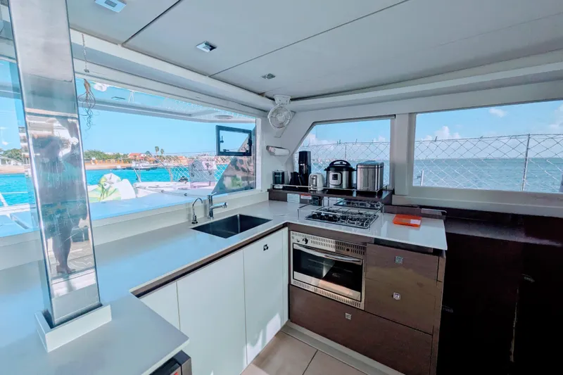 Slide: The Image of Modern kitchen interior on 2023 Leopard 42 yacht with ocean view. - 49