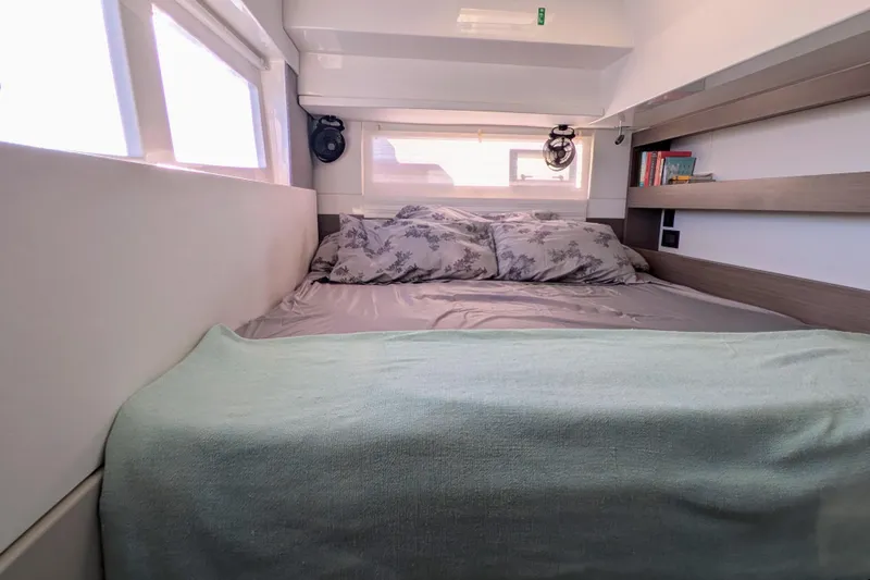 Slide: The Image of Cozy bedroom in 2023 Leopard 42 yacht with modern decor and natural light. - 66