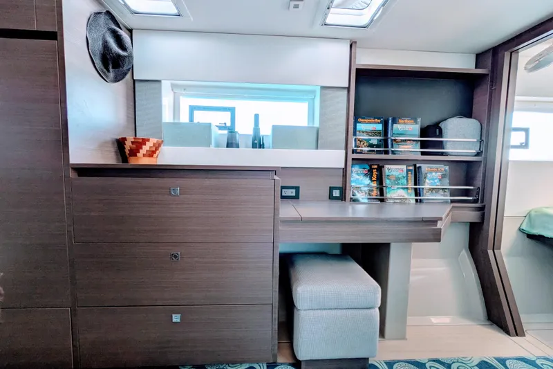 Slide: The Image of Modern interior of 2023 Leopard 42 yacht with sleek cabinetry and cozy seating. - 69