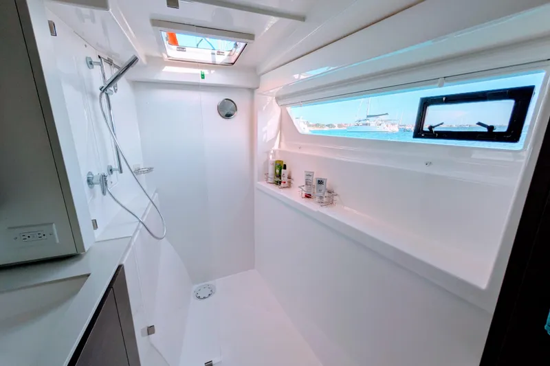 Slide: The Image of Modern bathroom in 2023 Leopard 42 yacht with shower and window view. - 71