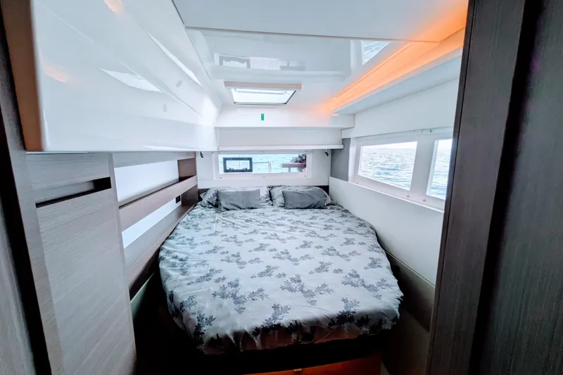 Slide: The Image of Luxurious bedroom interior of 2023 Leopard 42 yacht with ocean view windows. - 76