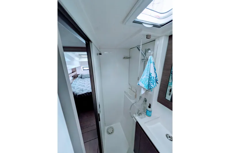 Slide: The Image of Modern bathroom in 2023 Leopard 42 yacht with shower and skylight. - 79