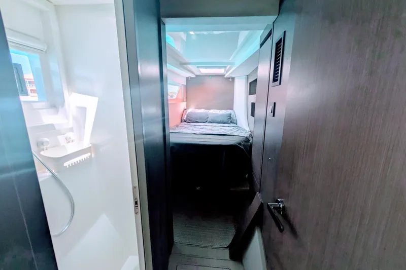 Slide: The Image of 2023 Leopard 42 yacht interior with cozy bedroom and modern bathroom. - 83