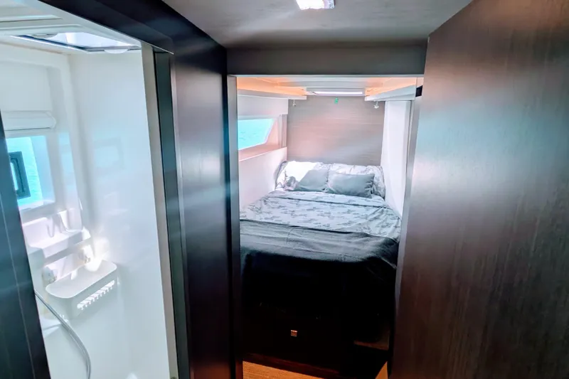 Slide: The Image of Luxurious bedroom interior of 2023 Leopard 42 yacht with modern design and ocean view. - 84