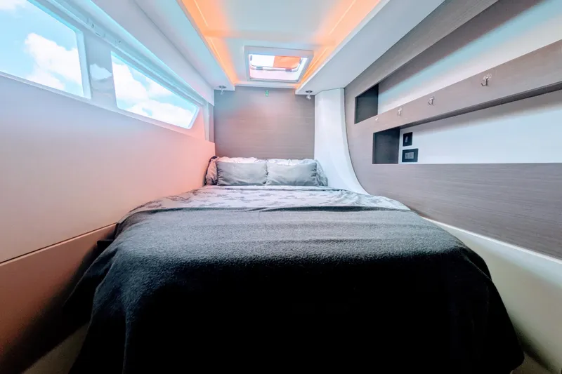 Slide: The Image of Luxurious cabin interior of 2023 Leopard 42 yacht with cozy bed and modern design. - 85