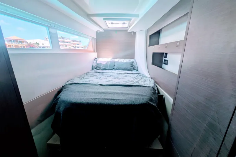 Slide: The Image of Luxurious cabin interior of 2023 Leopard 42 yacht with cozy bed and modern design. - 86