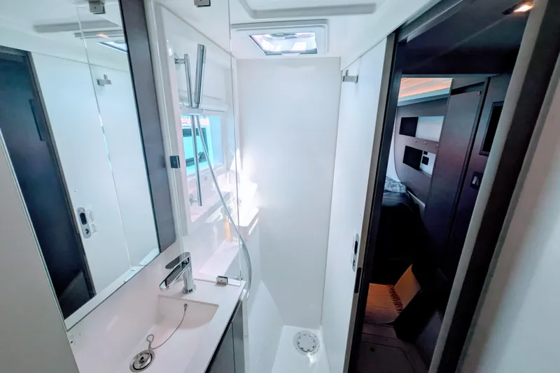 Slide: The Image of Modern bathroom interior on 2023 Leopard 42 yacht, featuring sleek design and compact layout. - 89